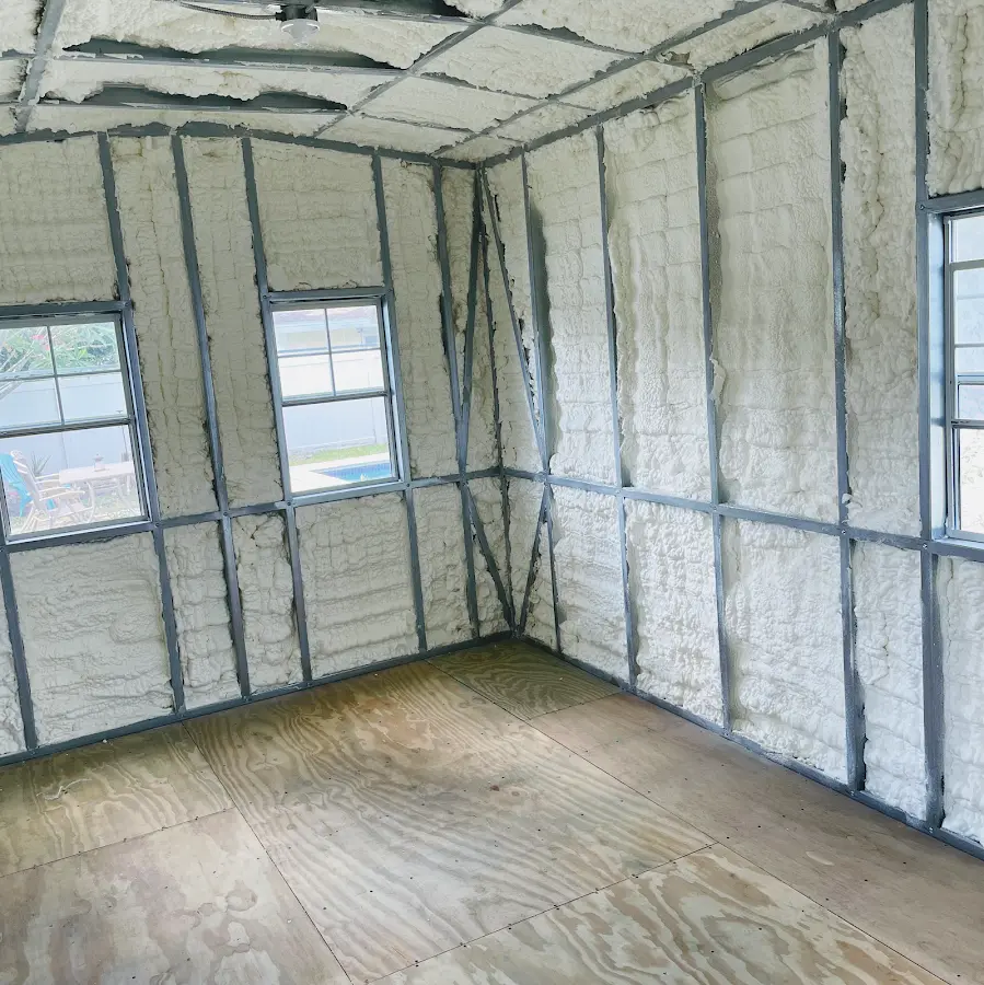 Closed-cell spray foam insulation applied to wall cavities in a residential project in Duarte